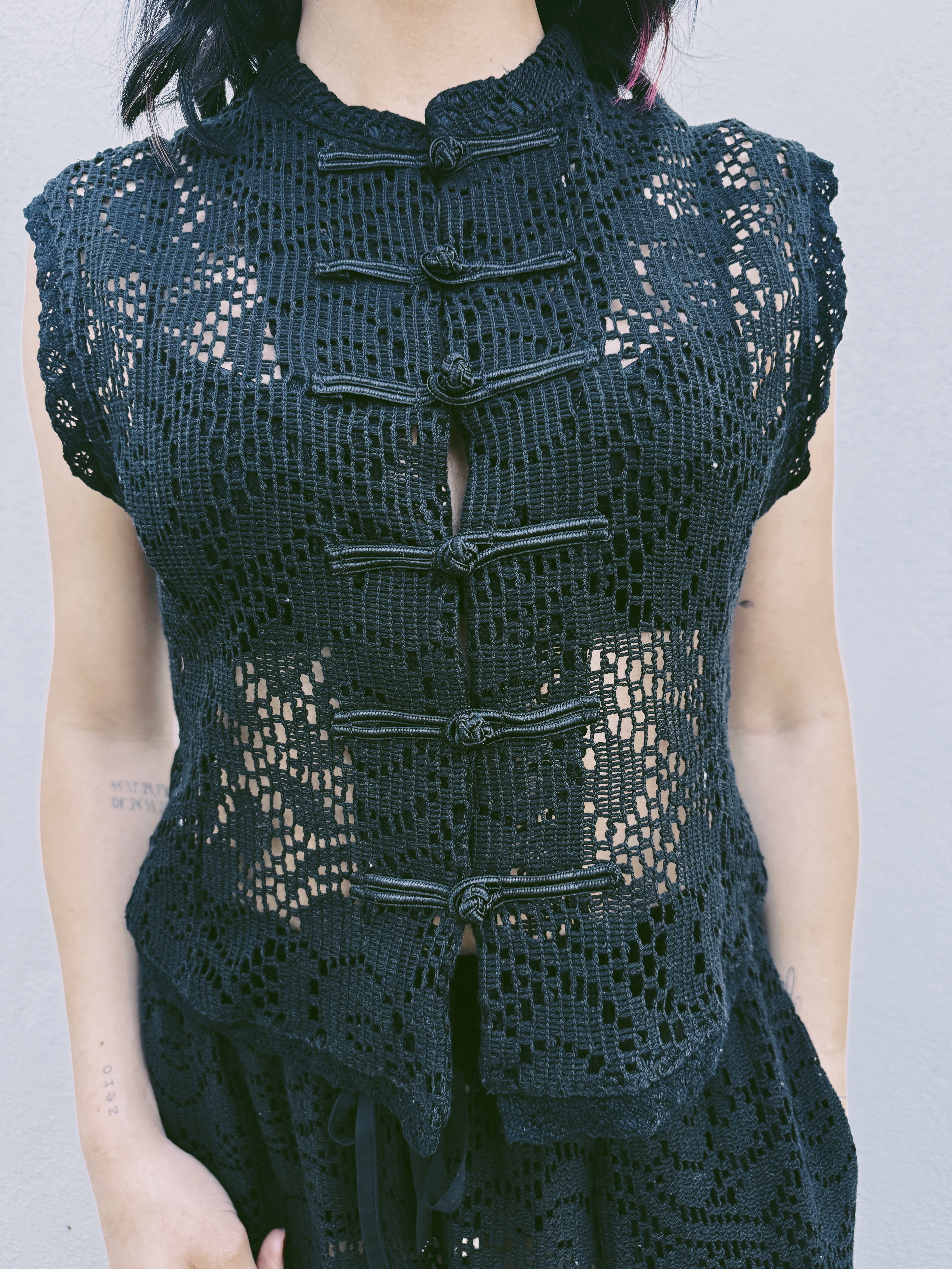 Gilet pizzo alamari